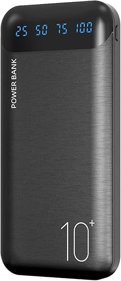 A sleek, charcoal-grey power bank features a digital LED display at the top showing battery increments of 25, 50, 75, and 100